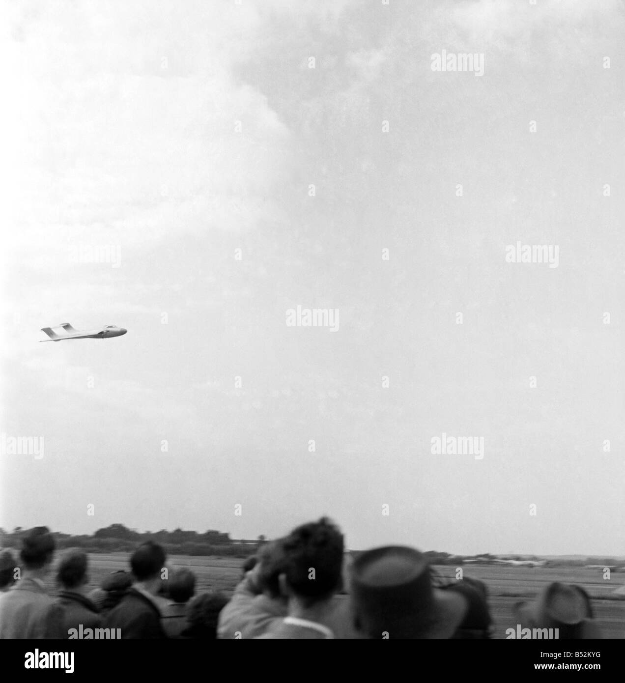 Thousands of spectators watched as a De Havilland 110 aircraft broke the sound barrier and then disintegrated in the sky above them and fell to earth.;Thirty-one people, including pilot John Derry, were killed. Dozens more were wounded at the Farnborough Air Show in Hampshire on 6 September 1952.;John Derry became the first British pilot to break the sound barrier, during a record attempt exactly four years before the accident. September 1952 C4399 Stock Photo