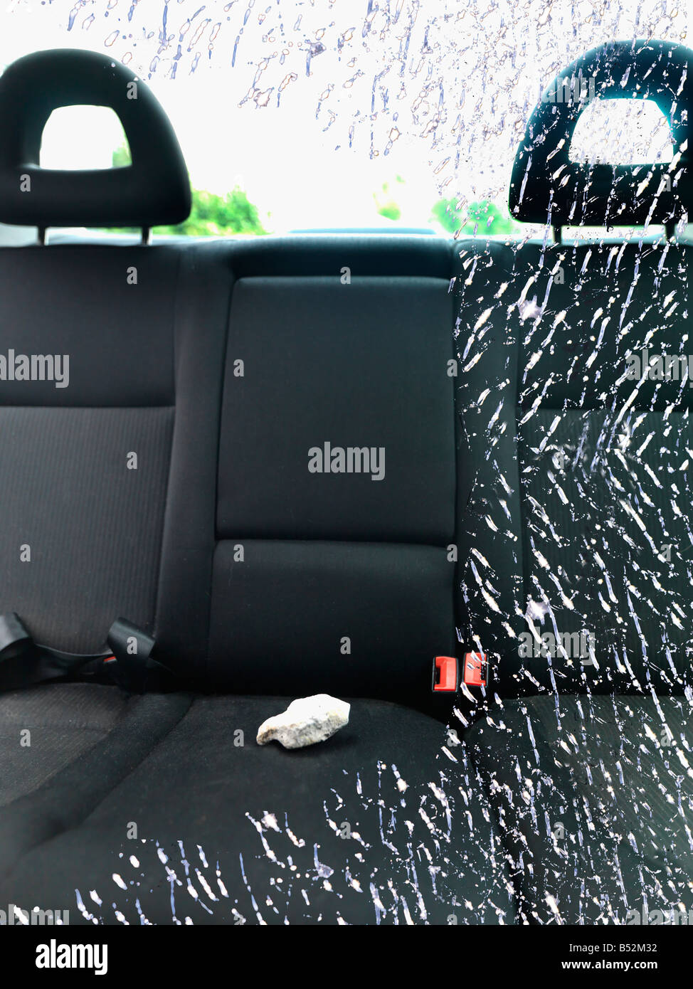 Smashed Glass Car and Stone Stock Photo Alamy