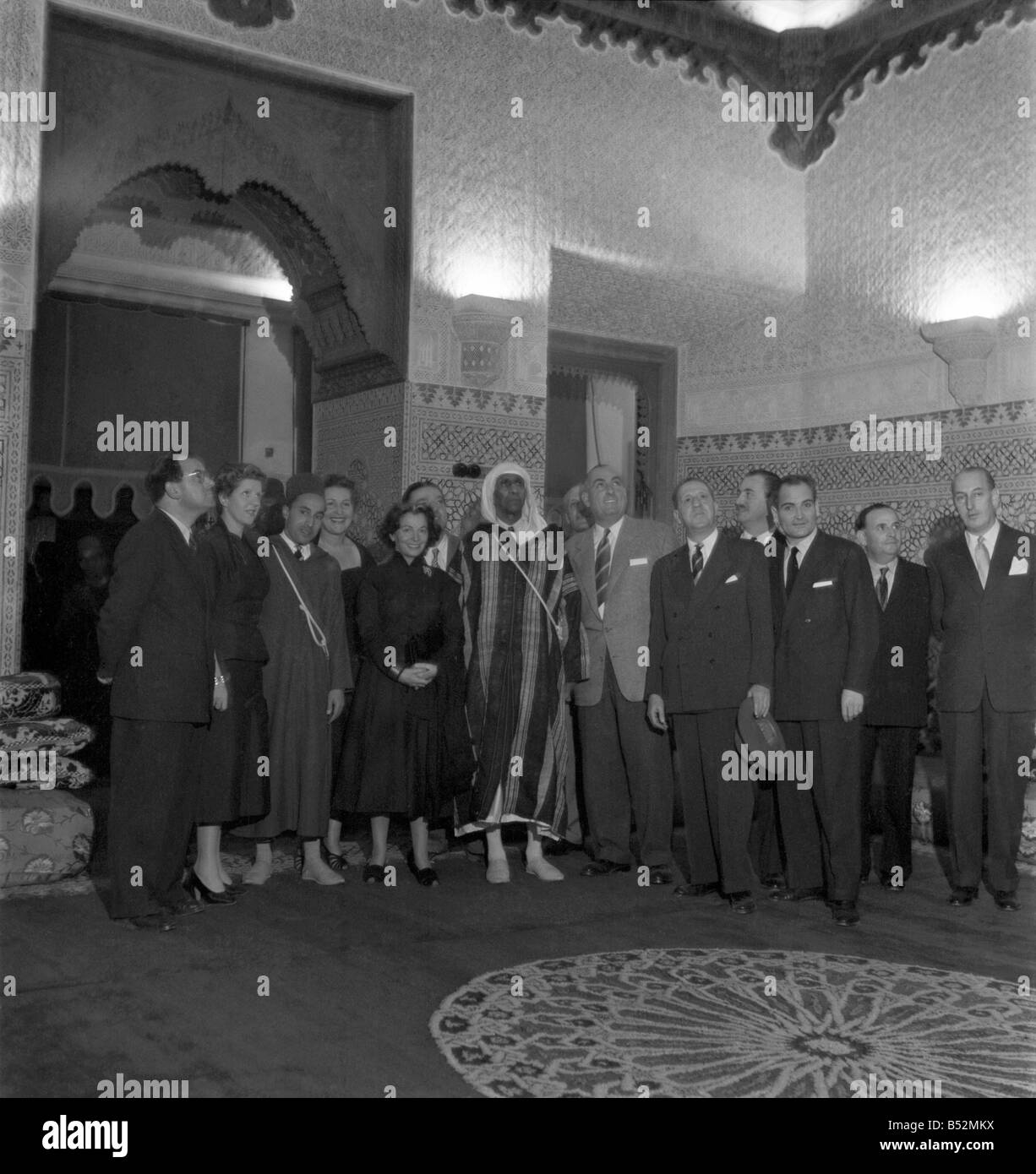 Local politicians and dignitaries at the thetre in Marrakech during a night out.&#13;&#10;December 1952 &#13;&#10;C5919-040 Stock Photo