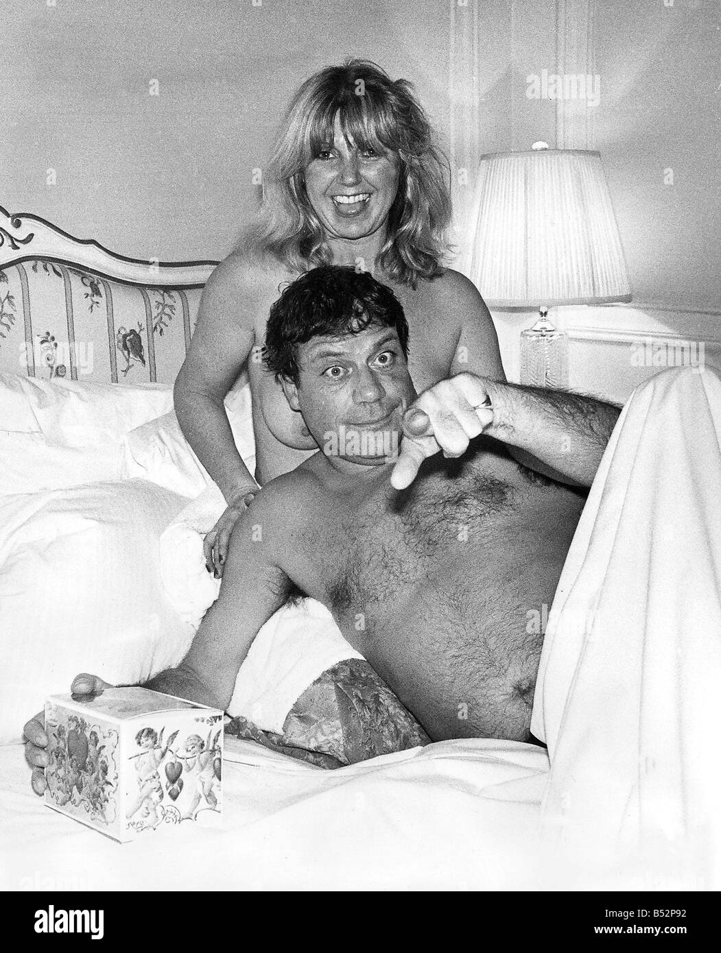 Elizabeth Ewall with Oliver Reed in Bed Stock Photo