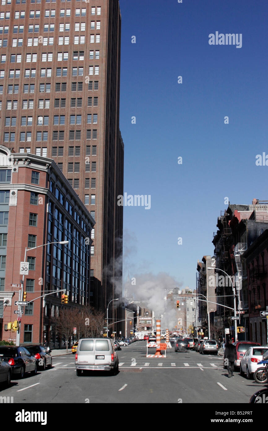 Smoke from street vents near Soho in Manhattan, New York Stock Photo