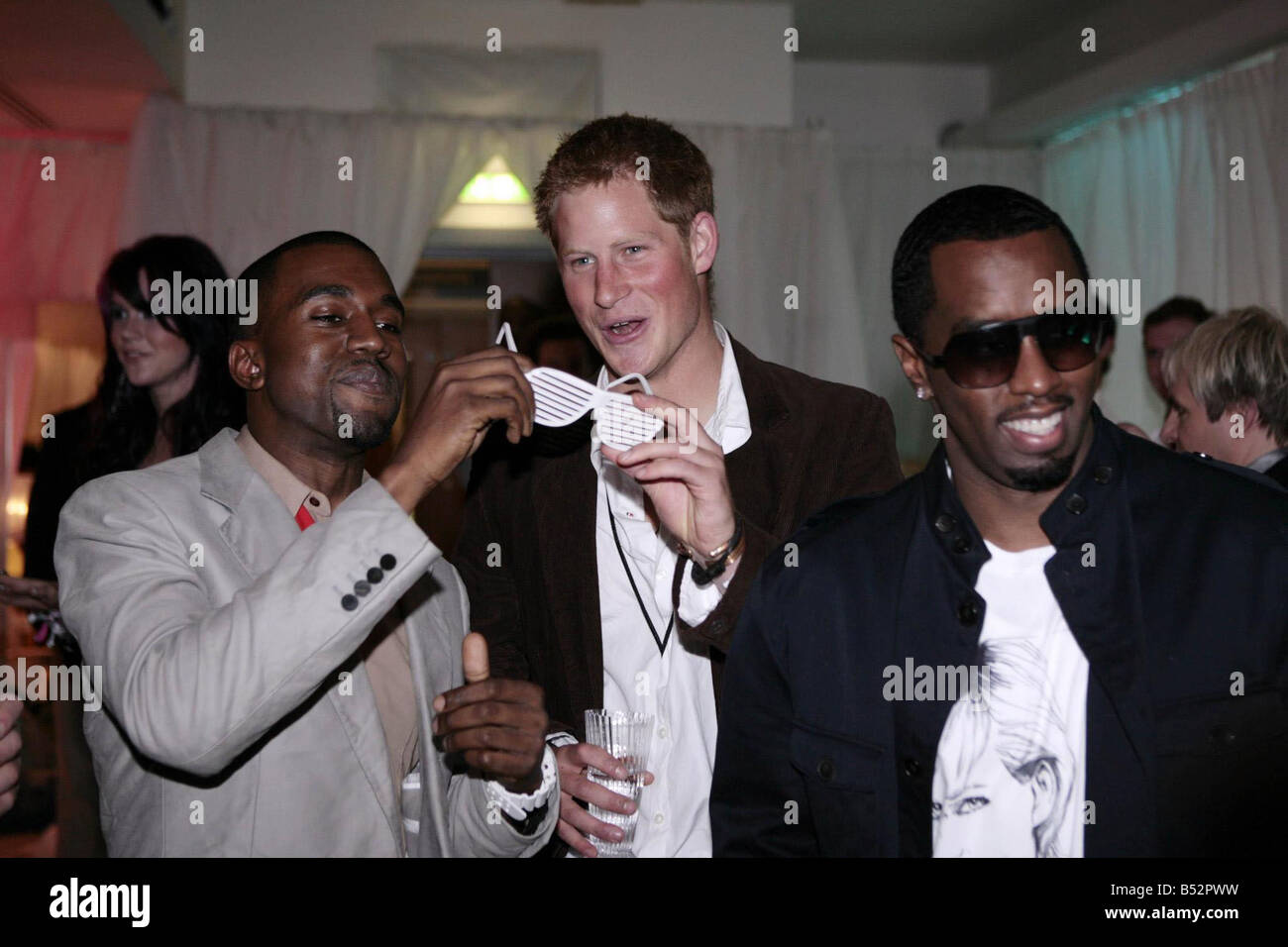 From left Kanye West Prince Harry and P Diddy at Wembley Stadium north
