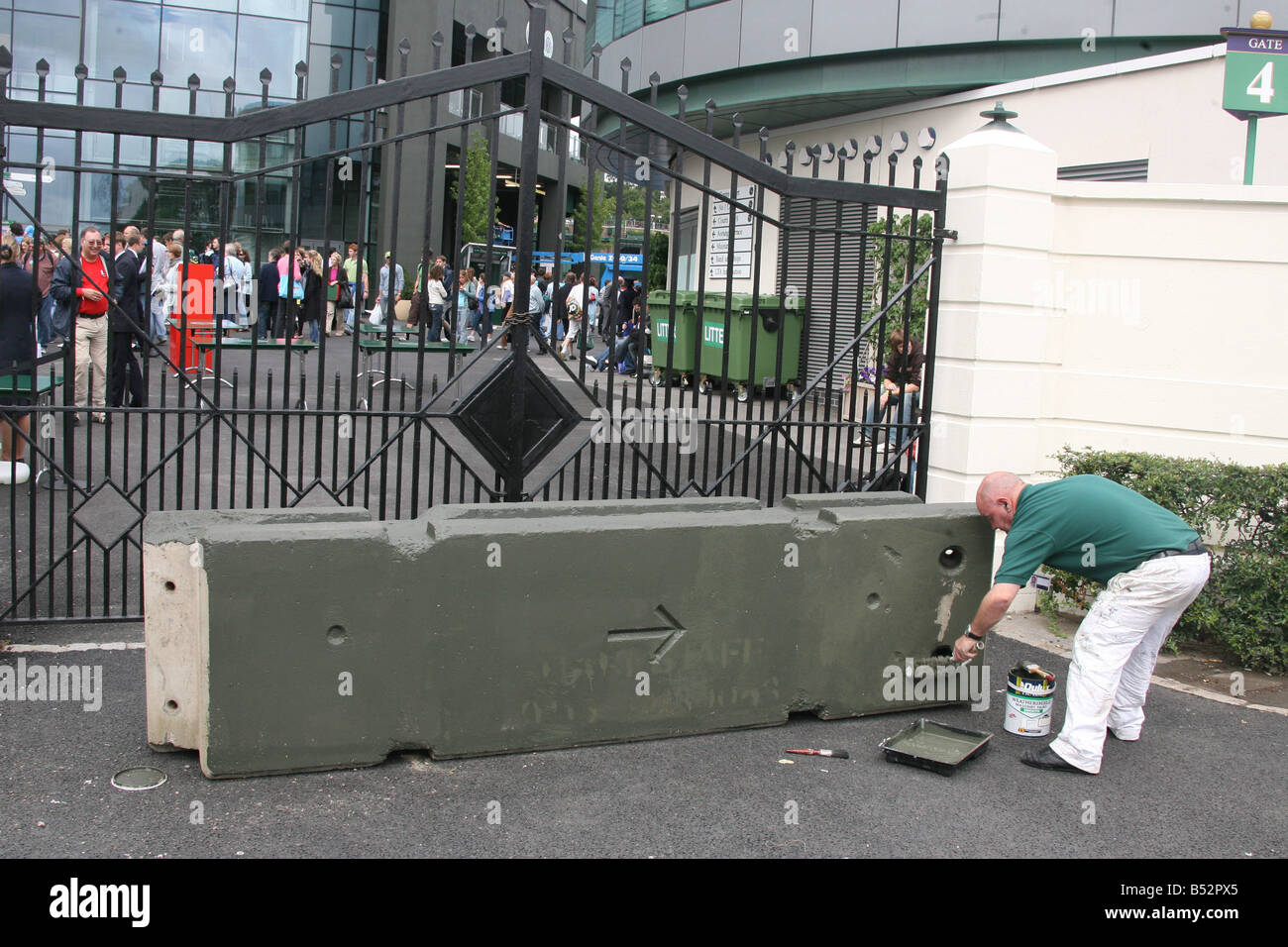 Concrete security blocks are erected at Wimbledon following the terrorist attack at Glasgow