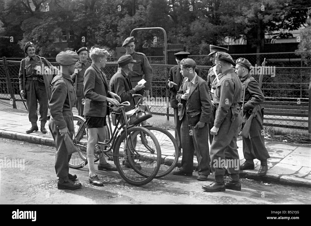 Scenes showing children talking to occupying soldiers in Berlin as the British Army occupied the city at the end of the Second World War.;July 1945 ;OL501A-005 Stock Photo