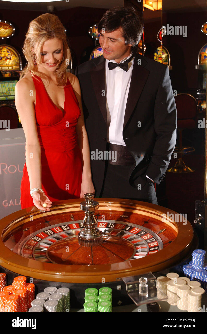 Casino Royale James Bond fashion pictured at the Riverboat Casino models Jane and Chris November 2006 Stock Photo