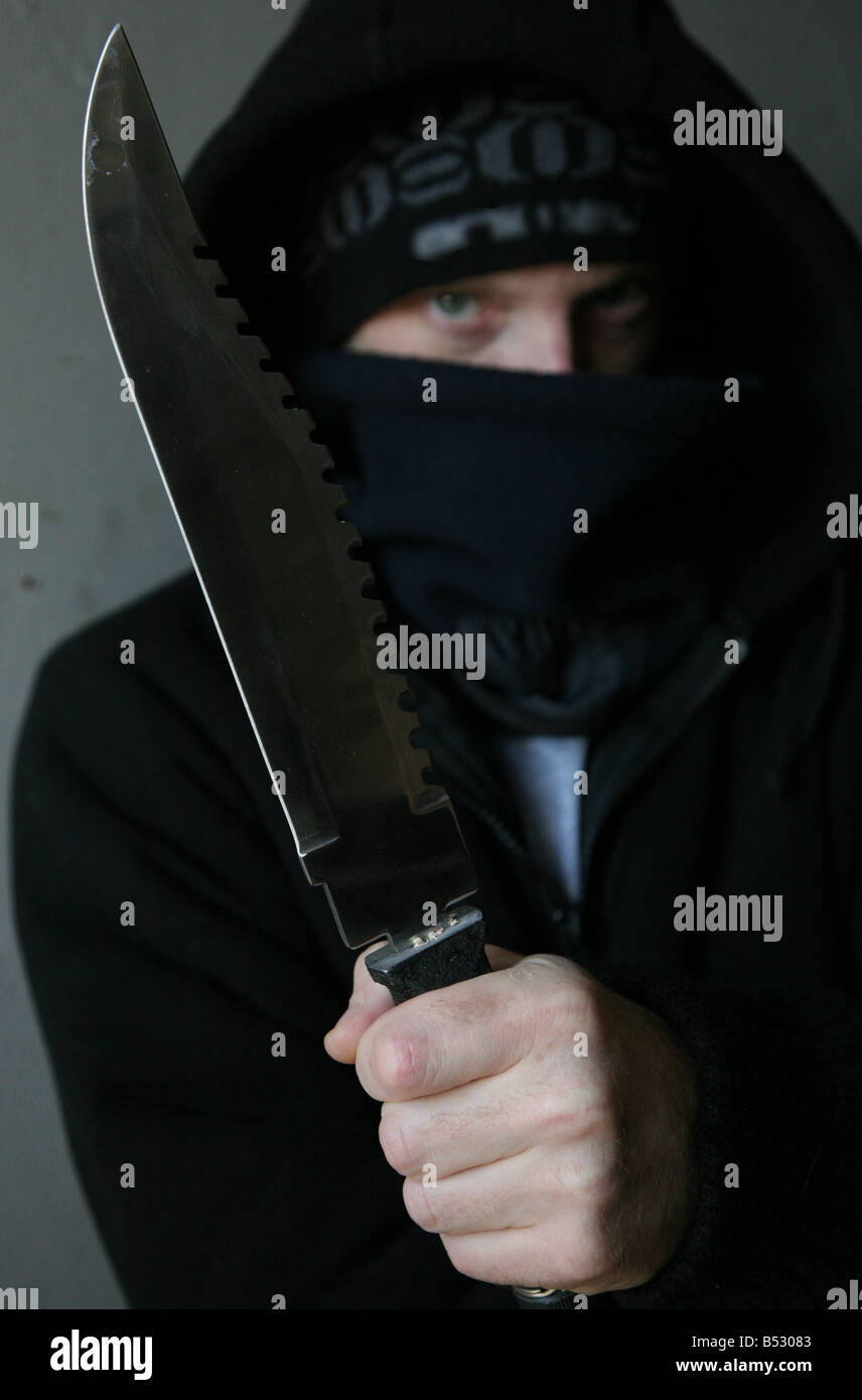 man holding knife Stock Photo - Alamy