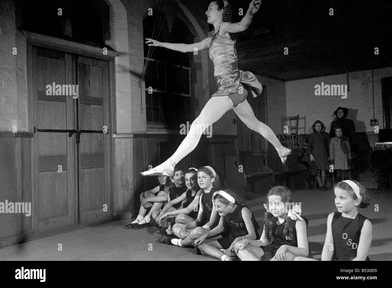 Ballet dancer Maureen Gardner gives instructions to children during one ...