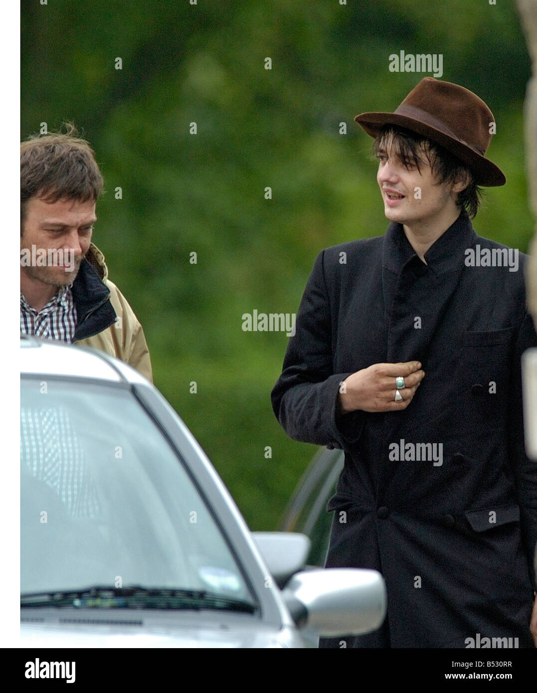 Pete Doherty outside with band member Mick Witnell at The Cygnet Hospital in Harrogate for his rehab course. Stock Photo