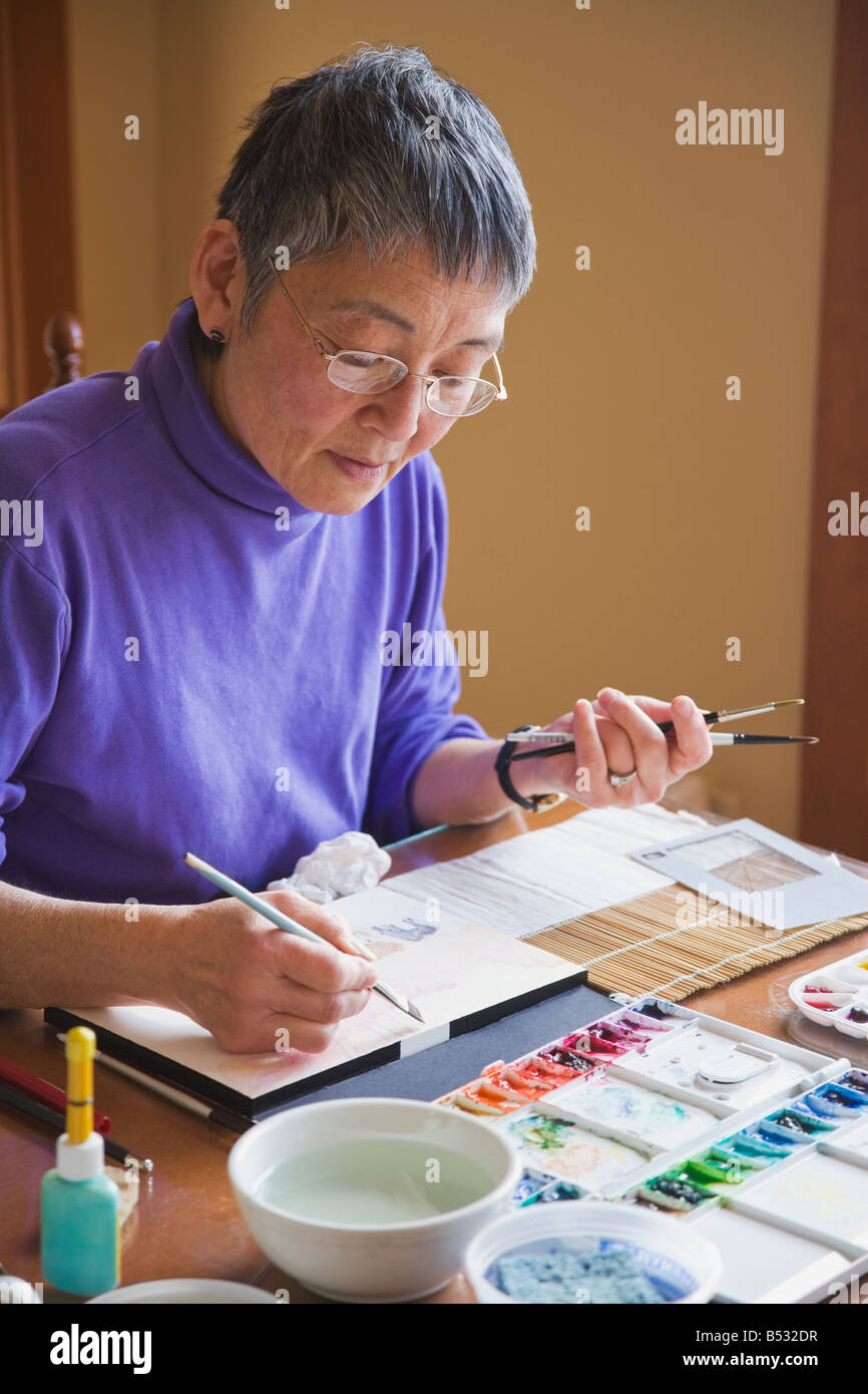 Art asian woman painting hi-res stock photography and images - Alamy