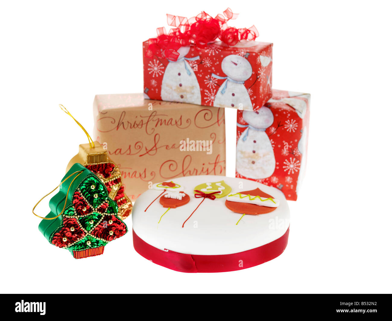 Traditional Rich Fruit Cake With White Icing Decorated For Christmas Isolated Against A White Background With No People And A Clipping Path Stock Photo