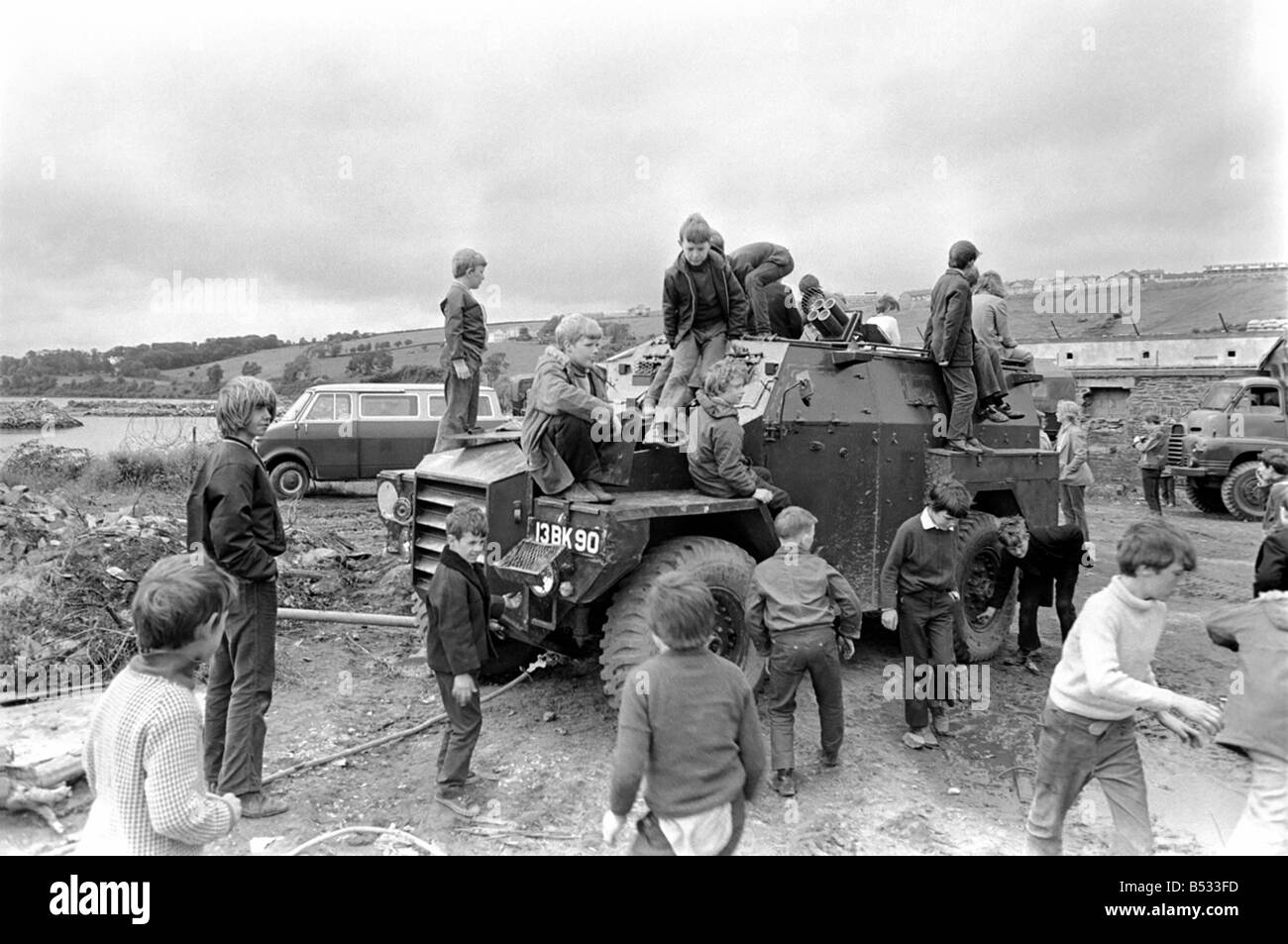 Northern Ireland June 1972. Children and soldiers play at the army base on the Foyle Road. The army were in the process of abandoning the camp. June 1972 72-7009-007 Stock Photo