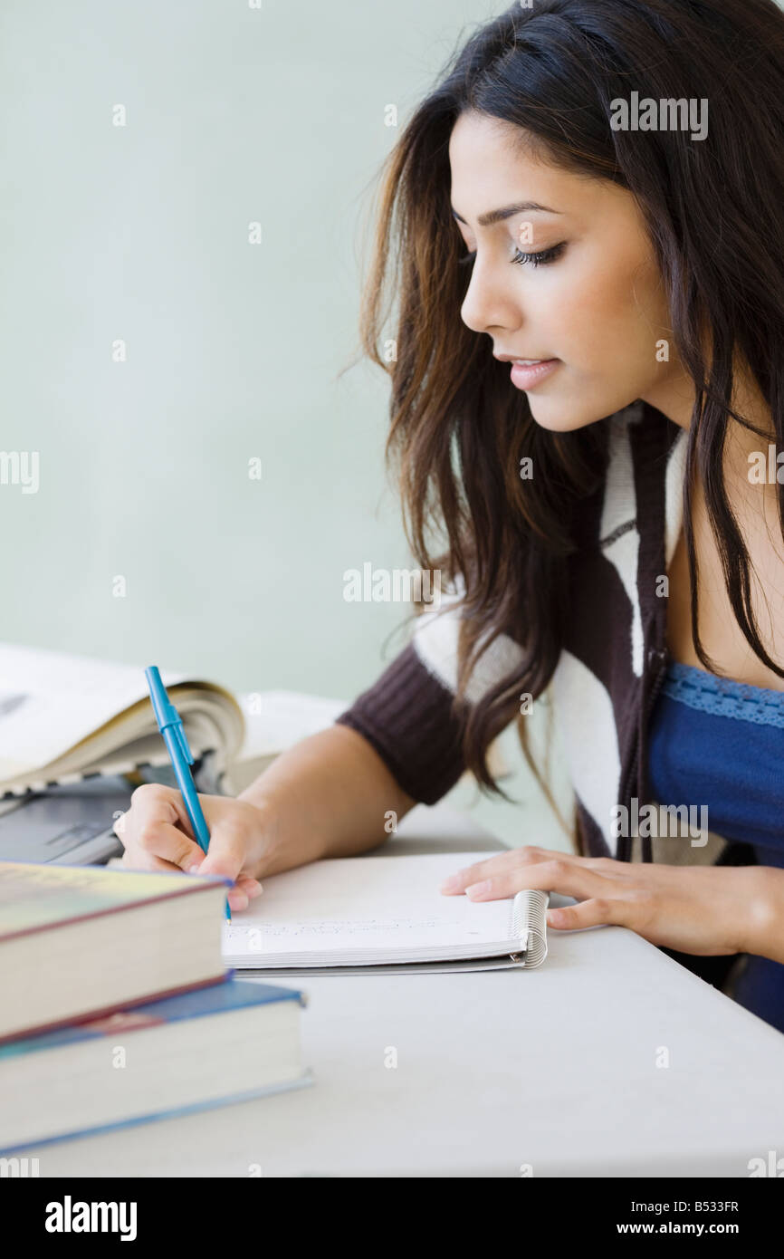 Middle Eastern woman studying Stock Photo