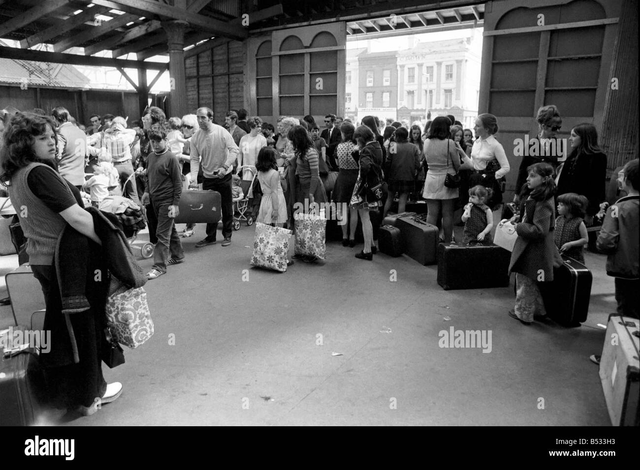 George Phillips, staff. Northern Ireland July 1972. Children waiting for the train in Belfast as families flee from the bombs and bullets. July 1972. July 1972 72-7262 Stock Photo