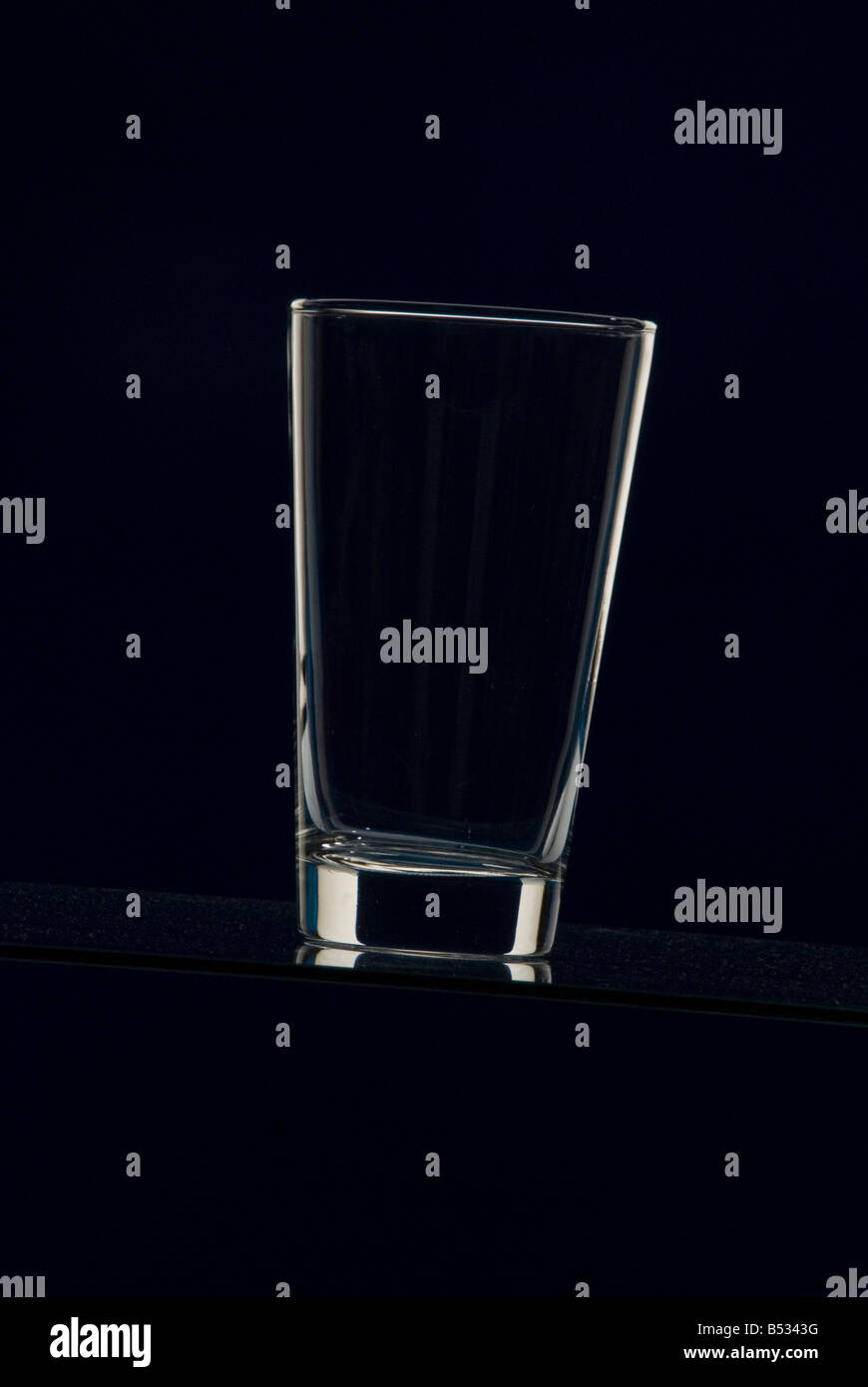 overflowing water glass Stock Photo