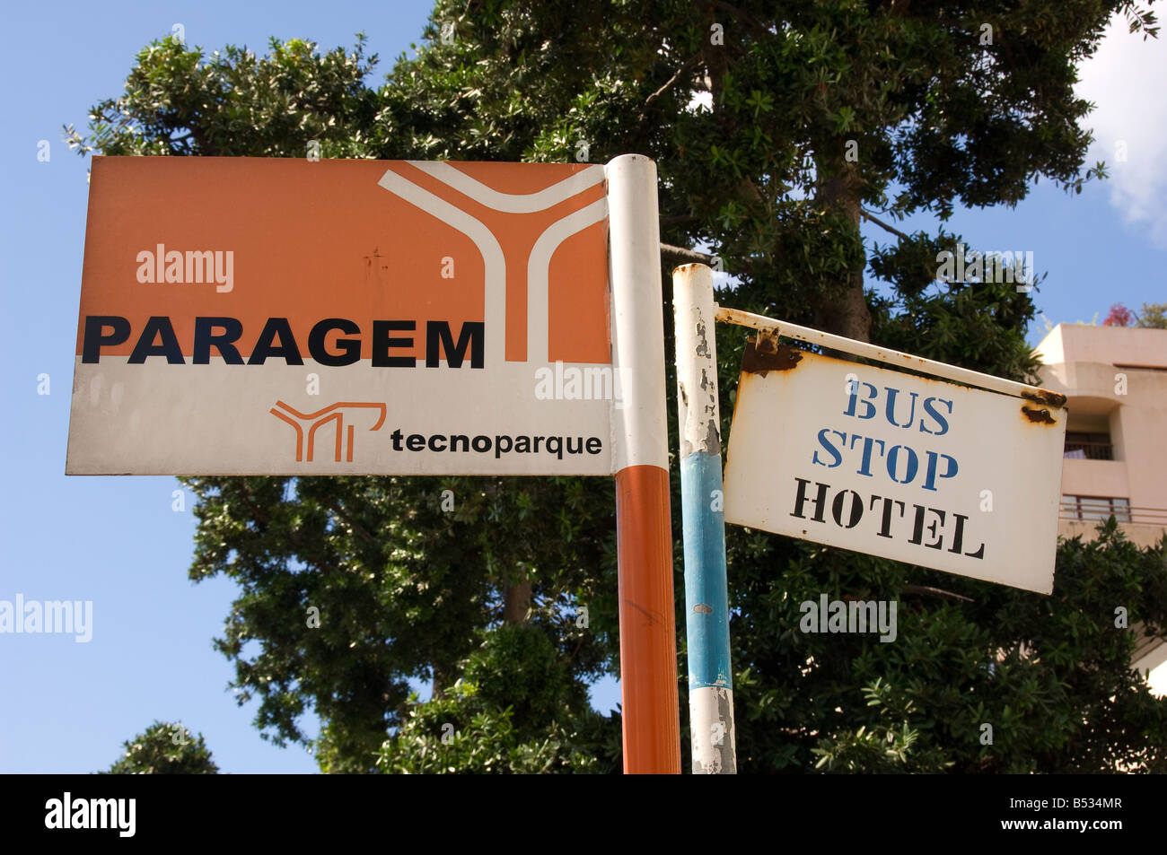 Close up of rusty old broken bus stop and hotel sign post Funchal Madeira Portugal EU Europe Stock Photo