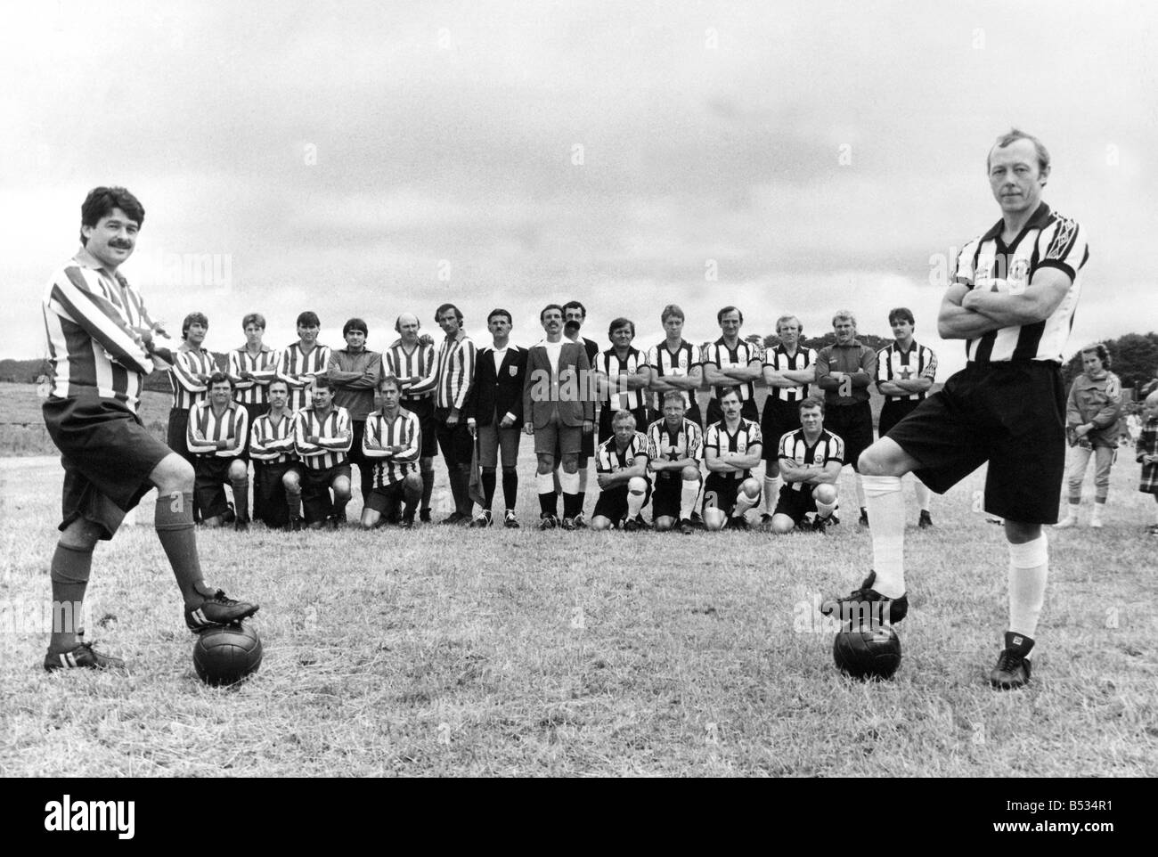 Rivals Bobby Kerr left and John Tudor with their teams at Beamish Museum for Geordie Day Stock Photo