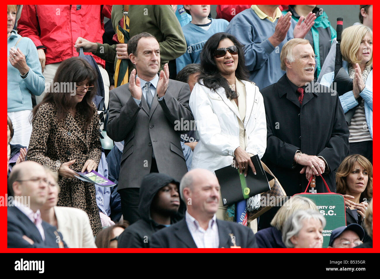 Wimbledon 25th June 2007 Day 1. The Mirror Pic. Ian Vogler. Tim Henman v Carlos Moya.;Bruce Forsyth with his wife and Angus Deayton on Centre Court Stock Photo