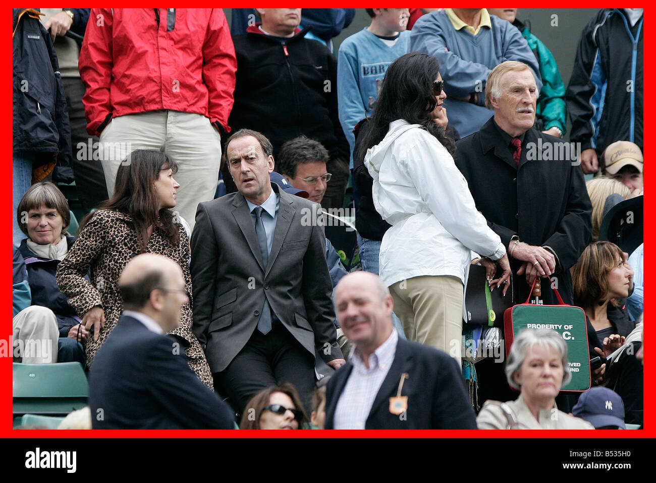 Wimbledon 25th June 2007 Day 1. The Mirror Pic. Ian Vogler. Tim Henman v Carlos Moya.;Bruce Forsyth with his wife and Angus Deayton on Centre Court Stock Photo
