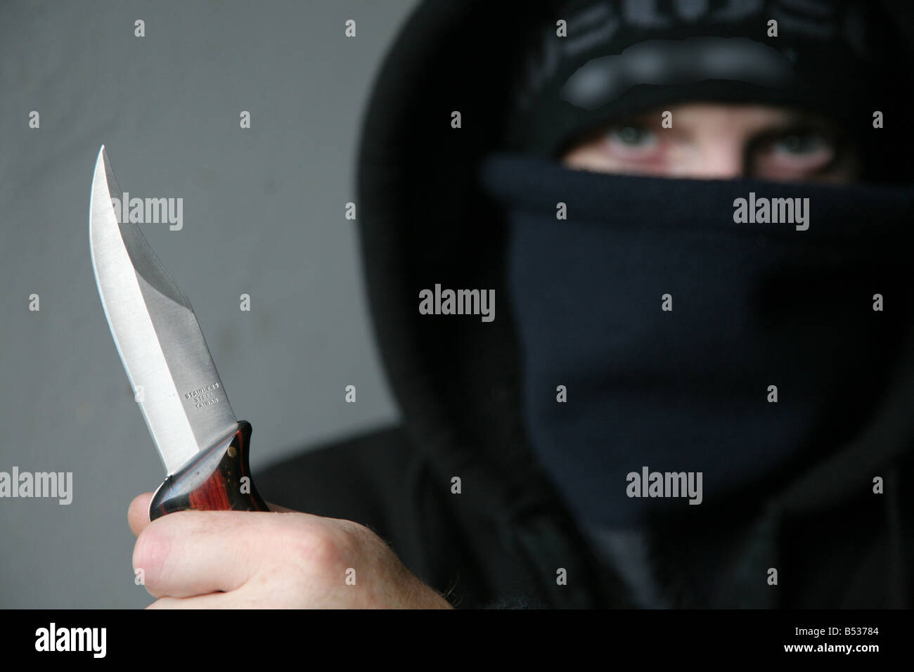 man holding knife Stock Photo Alamy