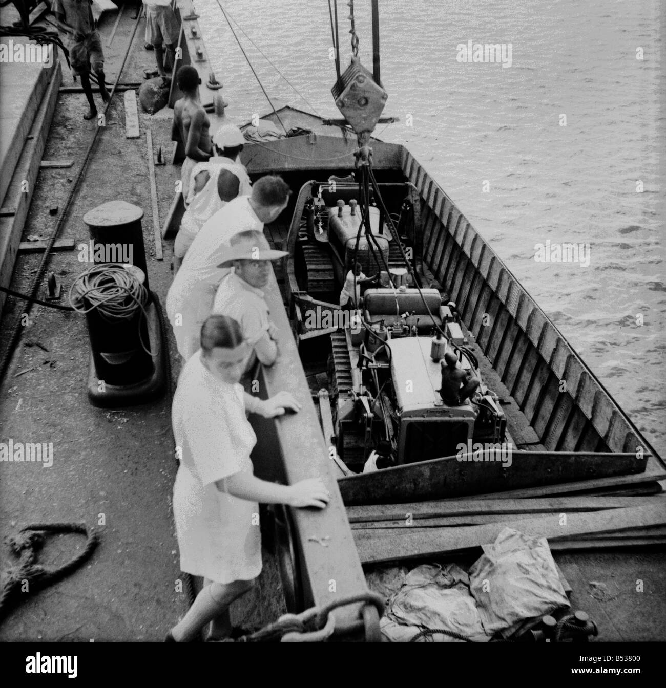 East African Groundnuts Scheme. Loading caterpillar tractors and road