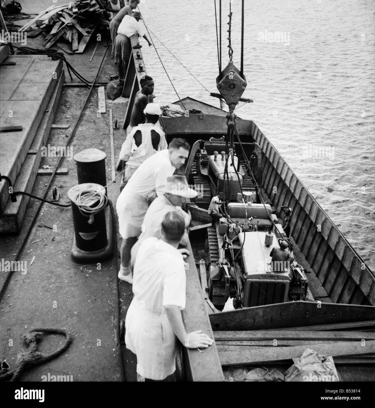 East African Groundnuts Scheme. Loading caterpillar tractors and road