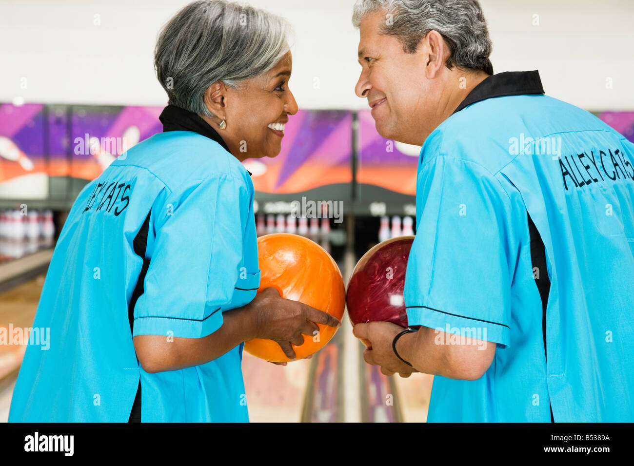 Two friends on bowling league about to bowl Stock Photo Alamy
