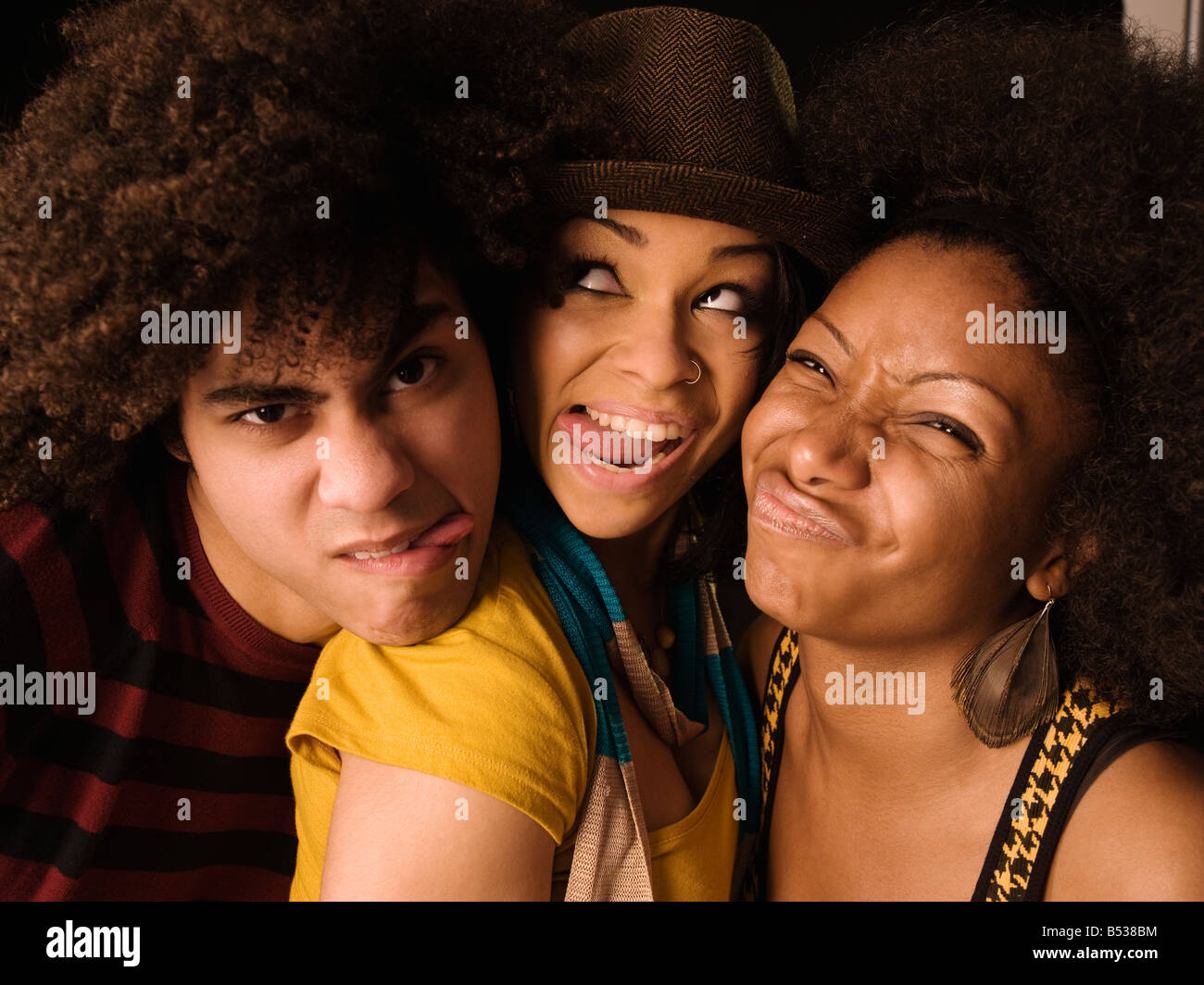 Multi-ethnic friends making faces Stock Photo