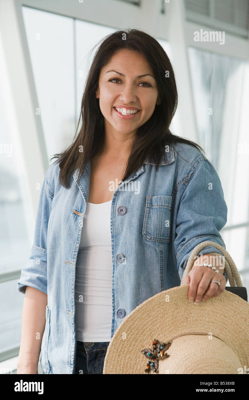 Woman airport ticket happy hi-res stock photography and images - Alamy