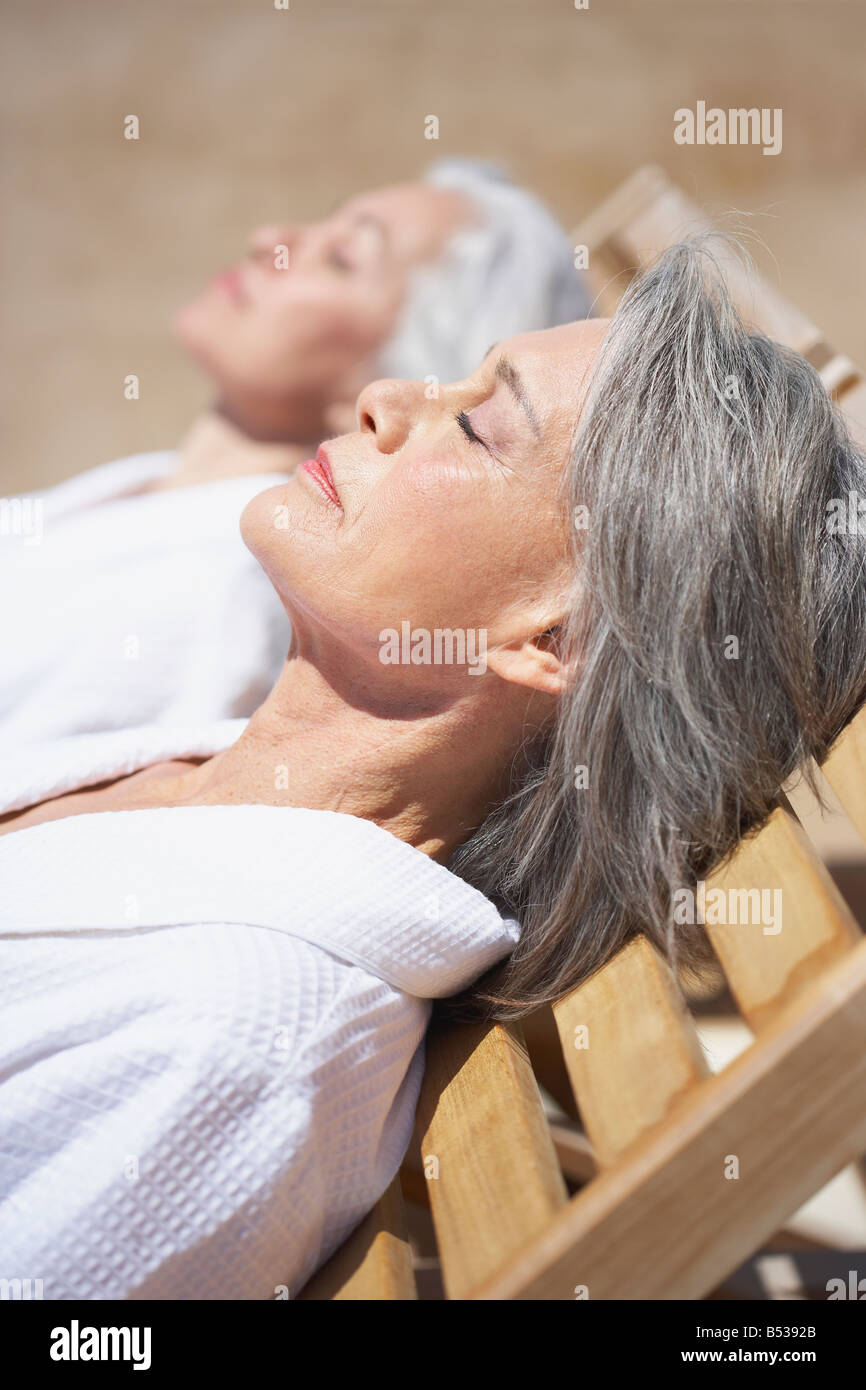 Friends Sleeping On Lounge Chairs High Resolution Stock Photography and