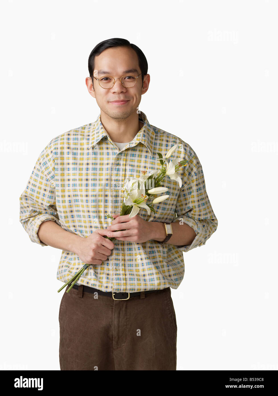 Asian young man holding bouquet hi-res stock photography and images - Alamy