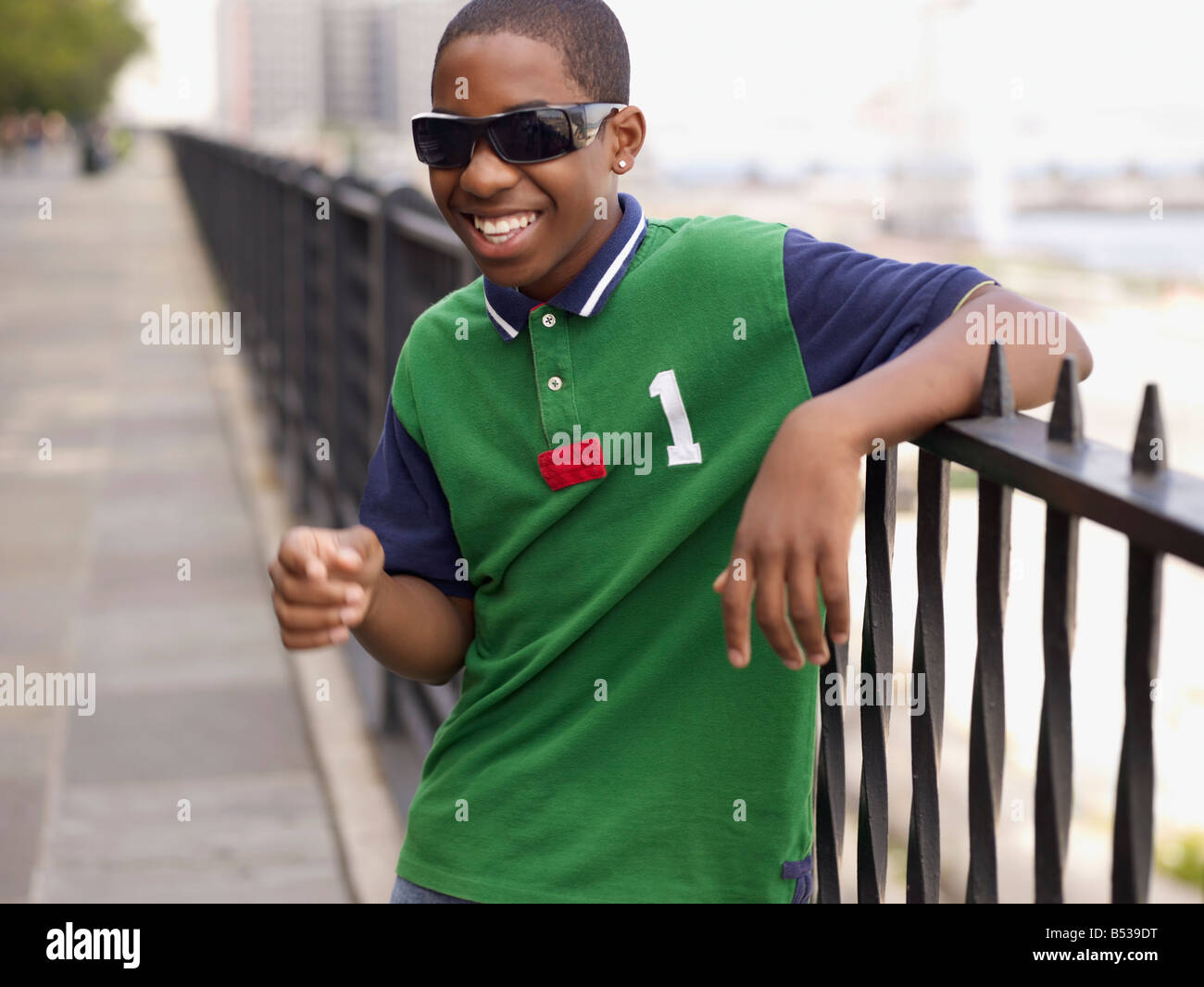 African teenage boy in sunglasses laughing Stock Photo - Alamy