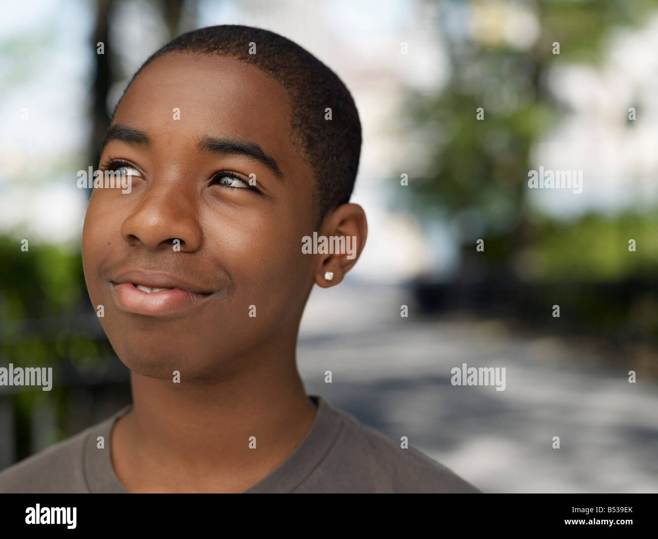 African teenage boy in urban park Stock Photo - Alamy