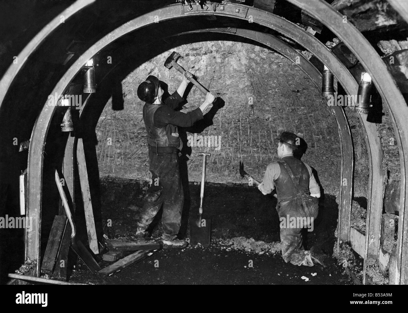 Coal Mines underground scenes: Miners at work. &#13;&#10;January 1944 &#13;&#10;P017836 Stock Photo
