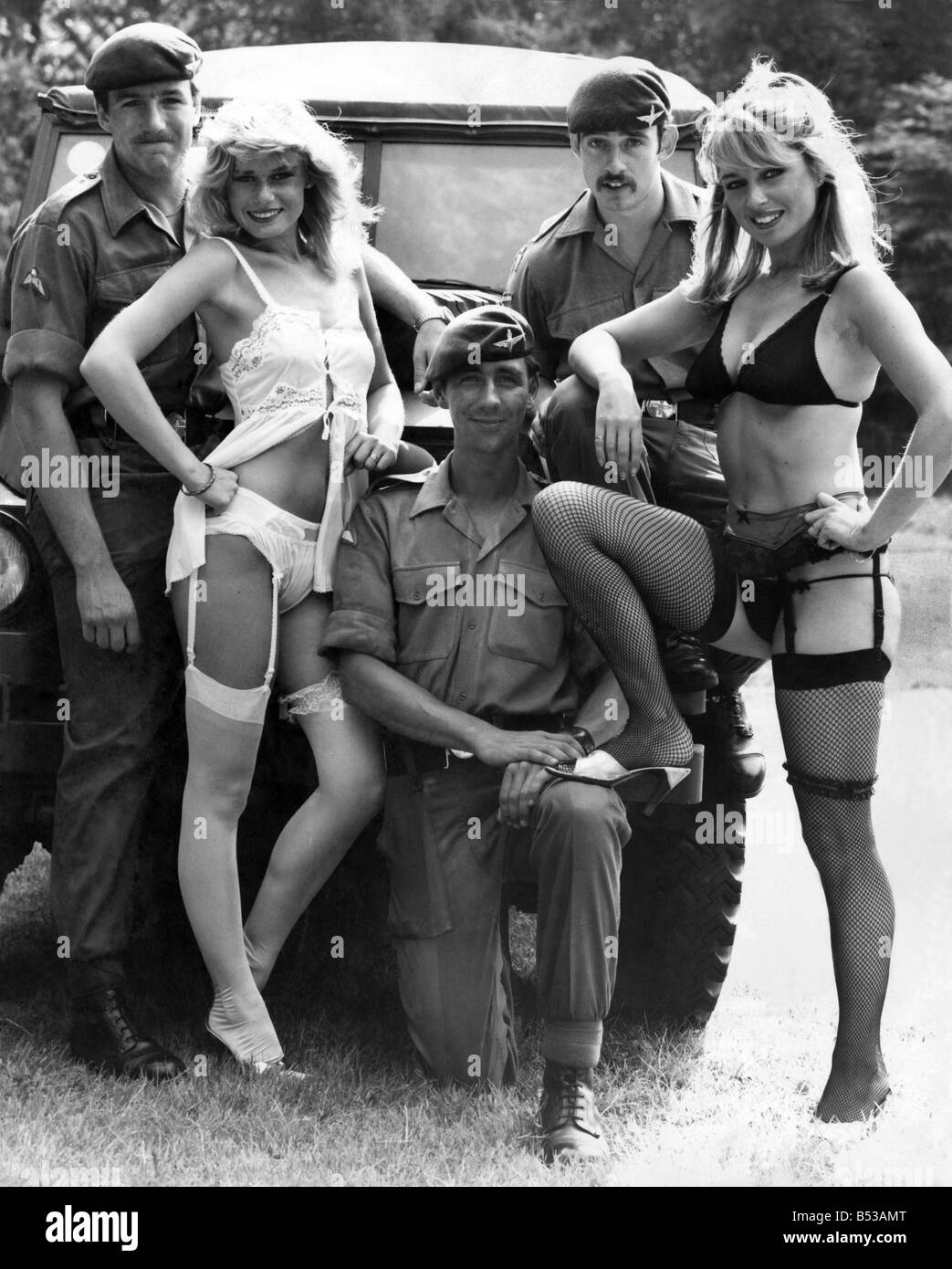 Clothing underwear. Three soldiers from the 2nd Battalion of the Parachute  Regiment pose with two women models in underwear - bra, knickers, stockings  and suspenders.;July 1982 P018289 Stock Photo - Alamy