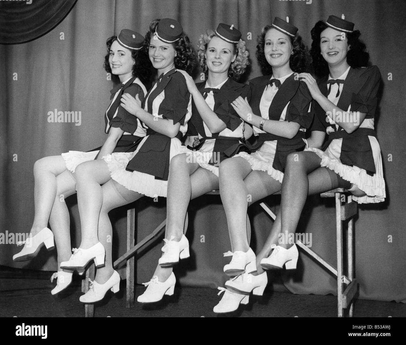 Clothing Stockings. These girls love their work. Left to right. Jean