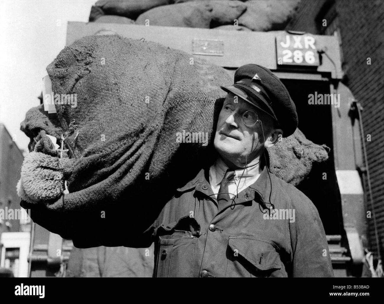 Ted Hiden, the monocled dustman of Mayfair, wants to know why a dustman shouldn't wear a monocle. Or why a dustman is not expected to own a yacht. ;August 1953 ;P018658 Stock Photo