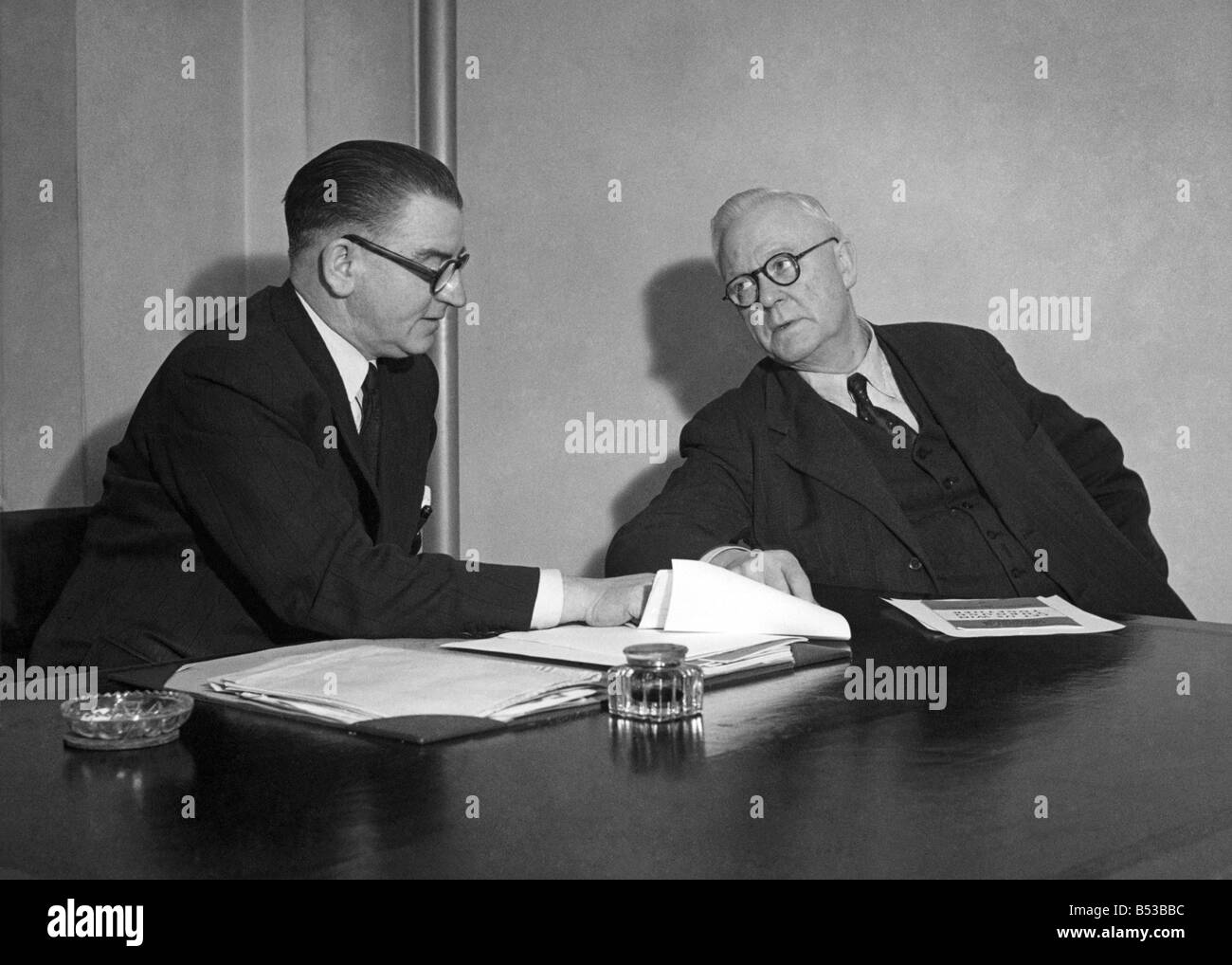 Mr. Morgan Phillips (left) with Mr. R.T Windle, national agent for Labour Party discussing at morning conference details for the days work. ;January 1950 ;P018672 Stock Photo