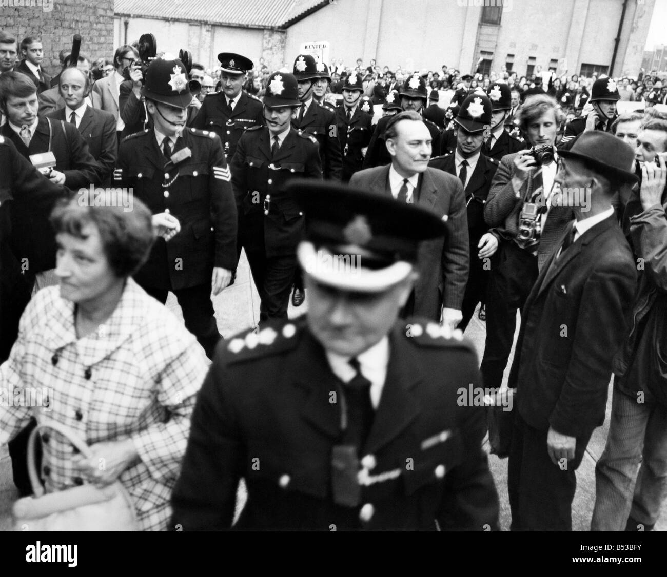 A police escort surrounds controversial Tory candidate Enoch Powell when he arrived to make an election speech at Wembley, Middlesex. ;June 1970 ;P018745 Stock Photo
