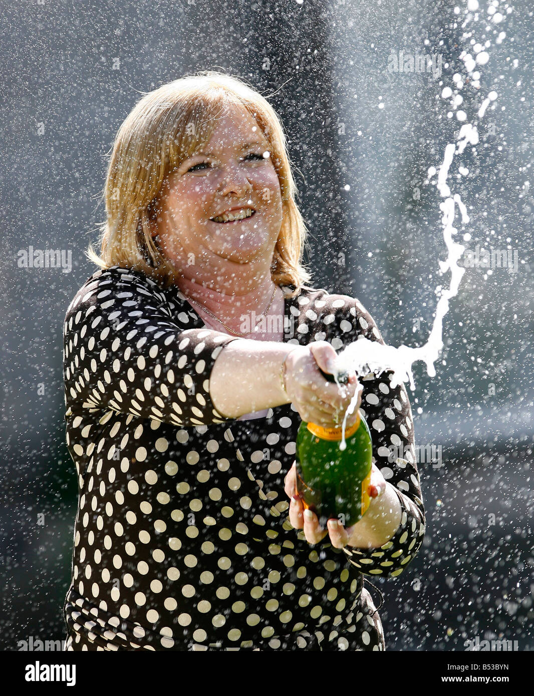 Record Euro Lottery winner Angela Kelly celebrates her win in front of assembled media, August 15, 2007 in Falkirk Scotland. Stock Photo