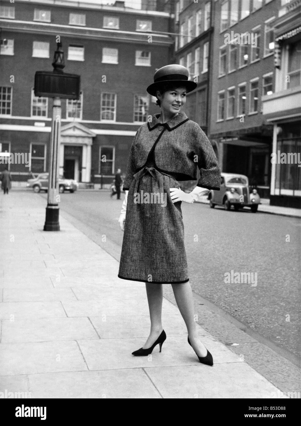 Fashion - 1960s. ;Spring chic! From all the elegant spring outfits shown by  the British top fashion boys the Ronald Paterson look is a sparkling  example of London chic. French model Anne