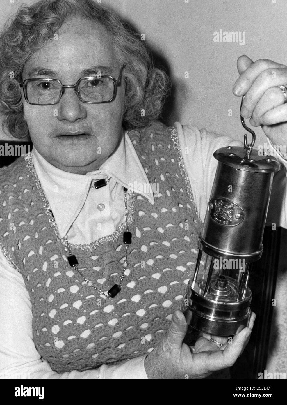 Mrs Rhoda Scutt, 72, of Hunston near Chichester, with her father's Miners Lamp found by chance in a local antique shop. ;Jan. 19 Stock Photo