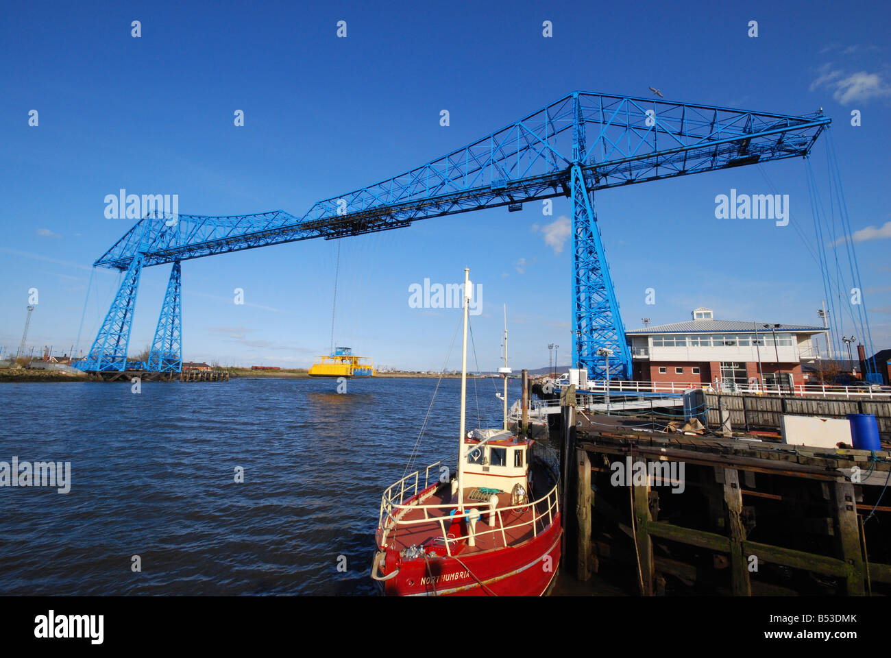 Middlesbrough transporter bridge with the transporter in the middle of The River Tees Stock Photo