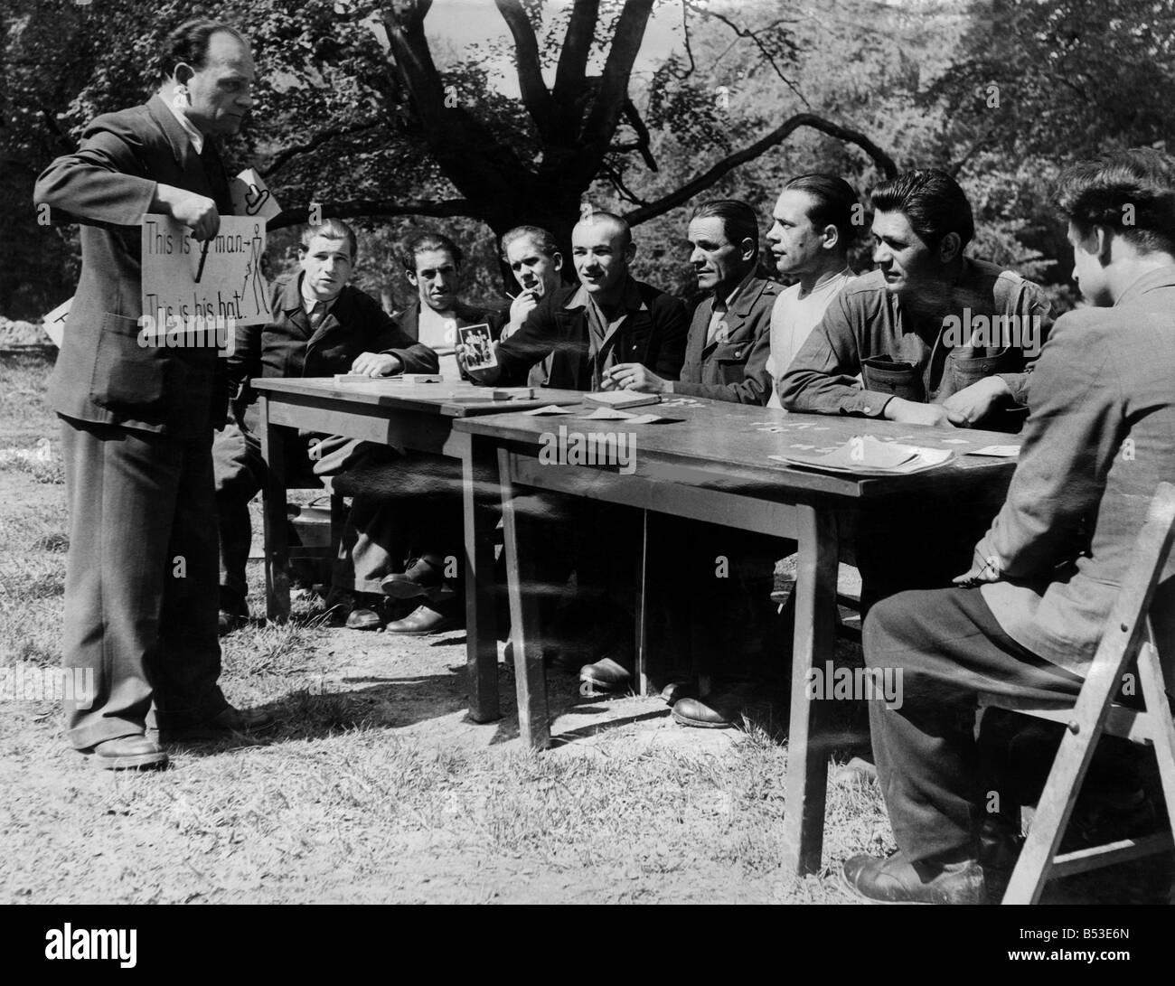 At the NCB's education centre at Bottisham, near Cambridge displaced persons are being taught in a short time (2 months) to speak sufficient English to work in the mines, know the rules, dangers and safety notices. May 1948 P018191 Stock Photo