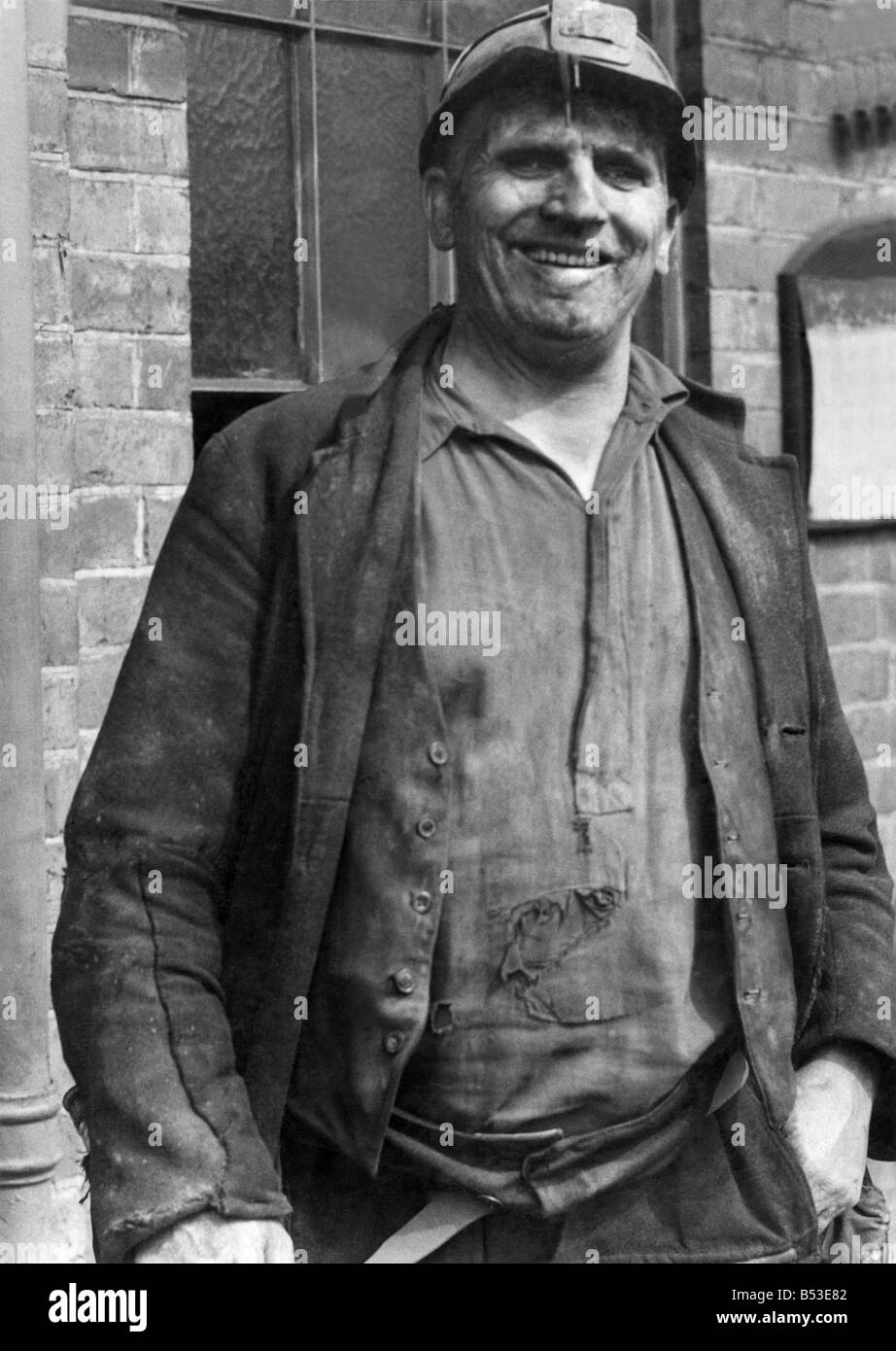 A smiling miner at the end of his shift&#13;&#10;August 1947 &#13;&#10;P018212&#13;&#10; Stock Photo