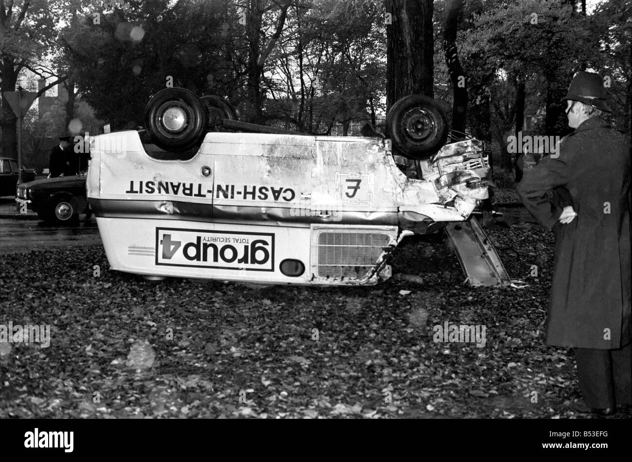 A group 4 security van upside down after the accident. November 1969
