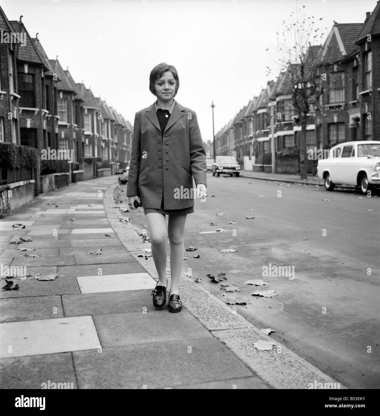 British family feature Young teenage girl wearing school uniform