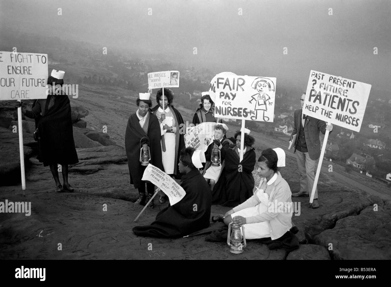 Nurses campaigned for more pay near Ilkley when they marched from the town centre to the Cow & Calf Rocks high on the Ilkley moors where they intend to camp. Pictures show the nurses on their way to the Cow and Calf Rocks;December 1969 ;Z11650-002 Stock Photo