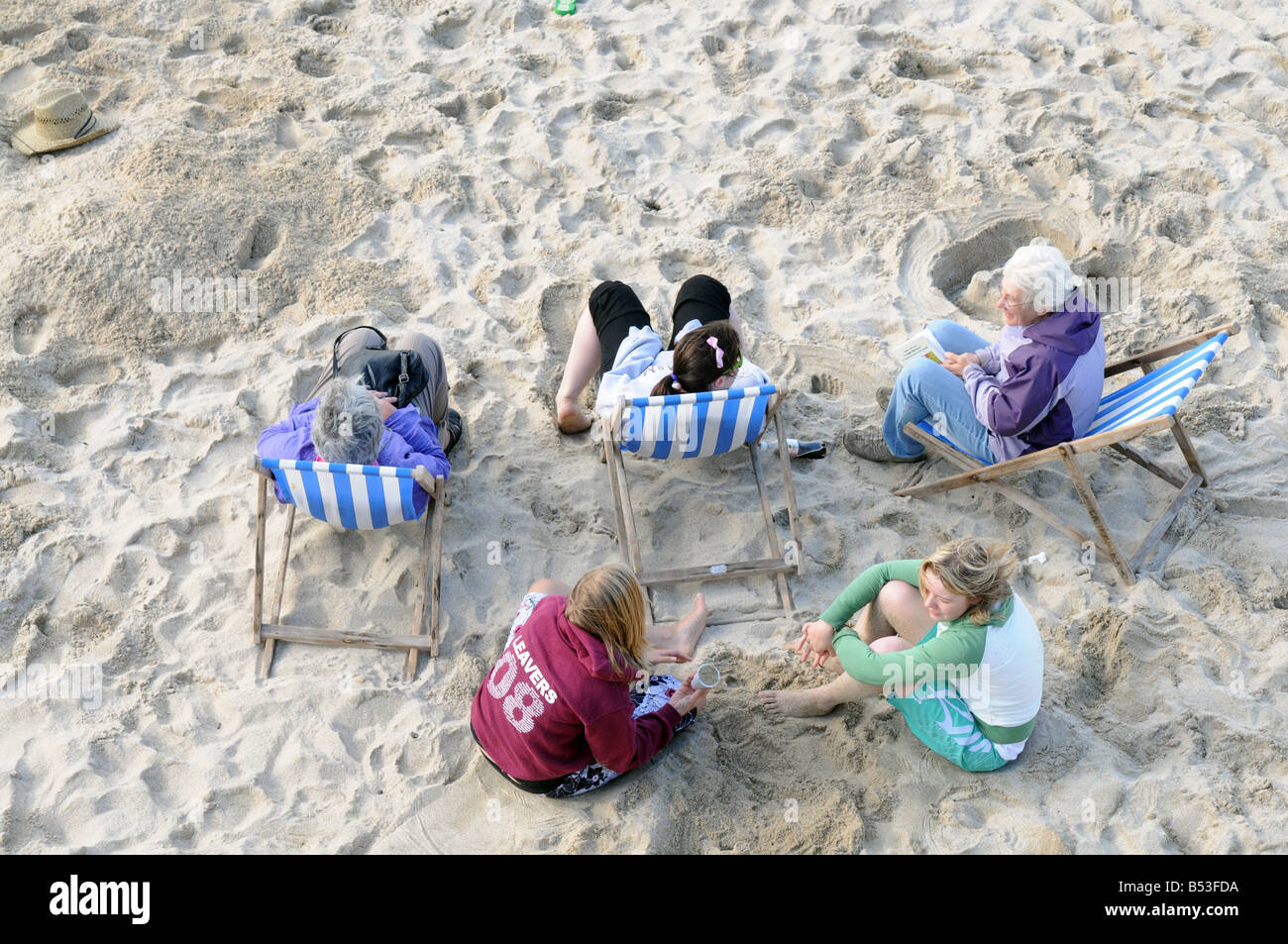 5 women on the beach at St Ives in Cornwall, UK Stock Photo