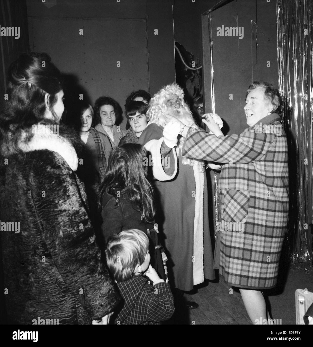 Christmas Humour - Santa. Father Christmas enjoys a dance at Lewis's store in Manchester. December 1969 Z11812-002 Stock Photo