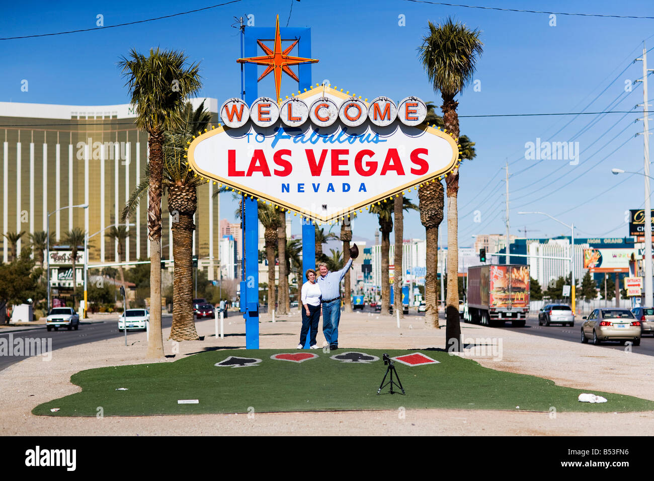 Two visitors to Las Vegas take a selfportrait underneath the iconic to Las Vegas sign